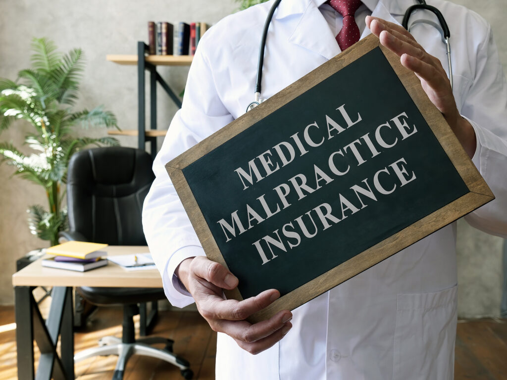 Medical Malpractice Insurance Or Professional Liability Concept.